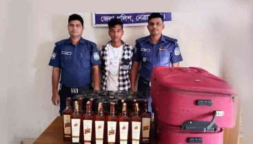 নেত্রকোনার বারহাট্টা থানা পুলিশের অভিযান ৩৫ বোতল মদসহ এক মাদক ব্যবসায়ী আটক