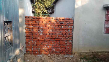 ভালুকায় ছোট ভাইয়ের জমি দখল, রাস্তায় দেয়াল তুলে পথ বন্ধ